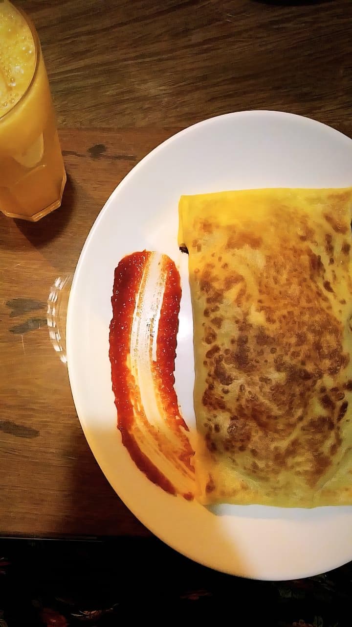 Crepe e suco de laranja no restaurante Parada do Conde, em Ouro Preto