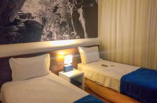Quarto com 2 camas de solteiro do VOA Business Supreme Choice Confins